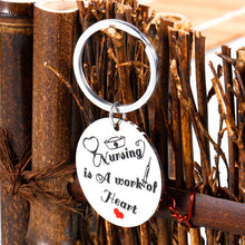 Load image into Gallery viewer, Nursing is A Work of Heart Keychain Nurse Ideal Gift Appreciation Gift for Women Men Nursing Day for Birthday Graduation