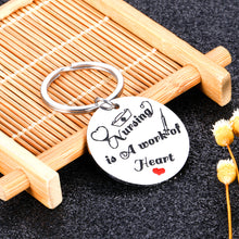 Load image into Gallery viewer, Nursing is A Work of Heart Keychain Nurse Ideal Gift Appreciation Gift for Women Men Nursing Day for Birthday Graduation