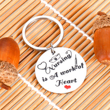 Load image into Gallery viewer, Nursing is A Work of Heart Keychain Nurse Ideal Gift Appreciation Gift for Women Men Nursing Day for Birthday Graduation